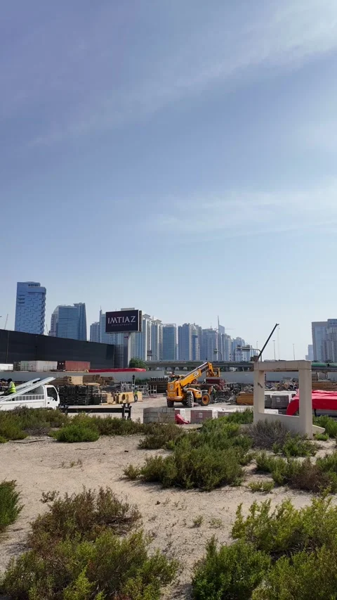 DUBAI, UAE - MAY 13, 2026: Construction site with crane and materials. Stock Footage 334767868