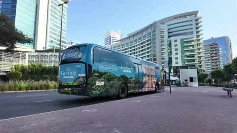 DUBAI, UAE - MAY 13, 2026: RTA public transport bus on the city street. Stock Footage 334768927