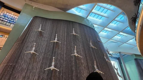 DUBAI, UAE - MAY 16, 2026: Cinematic shot of the indoor waterfall inside Du.. Stock Footage 335021908