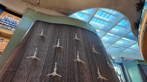 DUBAI, UAE - MAY 16, 2026: Cinematic shot of the indoor waterfall inside Du.. Stock Footage 335021963
