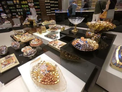 Dubai UAE - May 2019: Patchi chocolates and gift packs displayed in store for Stock Photos