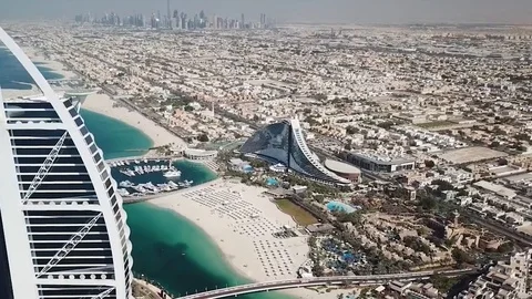 Dubai, UAE - May 25, 2018: Aerial view of Burj Al Arab luxury hotel on the coast Video stock 90538802