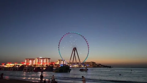 Dubai, UAE - May 25, 2026: Luxury yachts and boats docked at a marina harbor. Stock Footage 335643376