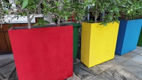 Dubai, UAE - May 26, 2026: Various colorful flower pots in a garden. Stock Footage 333208858