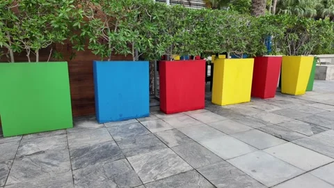 Dubai, UAE - May 26, 2026: Various colorful flower pots in a garden. Stock Footage 333208873