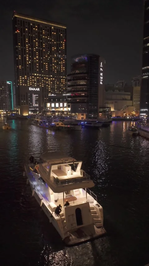 Dubai, UAE - May 26, 2026: Yachts docked in Dubai Marina. Stock Footage 335632107
