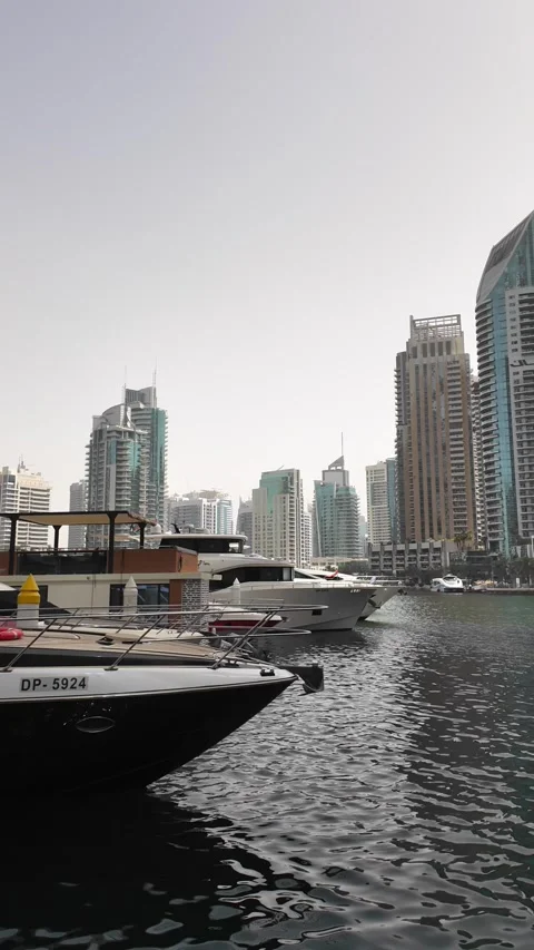 Dubai, UAE - May 26, 2026: Yachts docked in Dubai Marina. Stock Footage 335632605