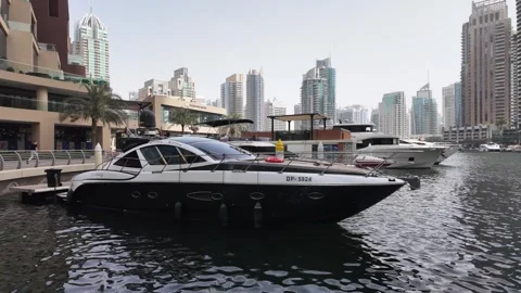 Dubai, UAE - May 26, 2026: Yachts docked in Dubai Marina. Stock Footage 335632676