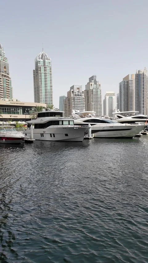 Dubai, UAE - May 26, 2026: Yachts docked in Dubai Marina. Stock Footage 335632950