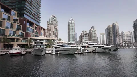 Dubai, UAE - May 26, 2026: Yachts docked in Dubai Marina. Stock Footage 335633141