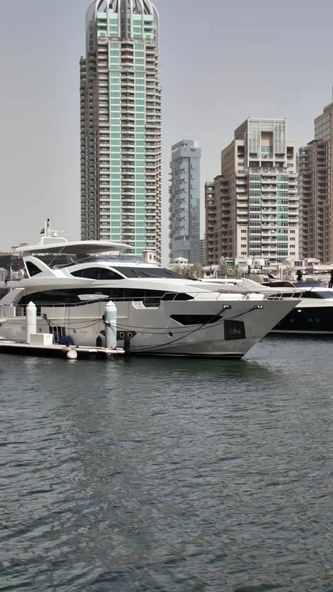 Dubai, UAE - May 26, 2026: Yachts docked in Dubai Marina. Stock Footage 335633800