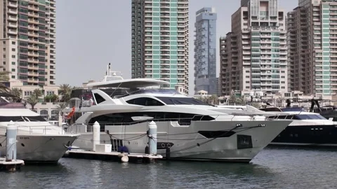 Dubai, UAE - May 26, 2026: Yachts docked in Dubai Marina. Stock Footage 335633838