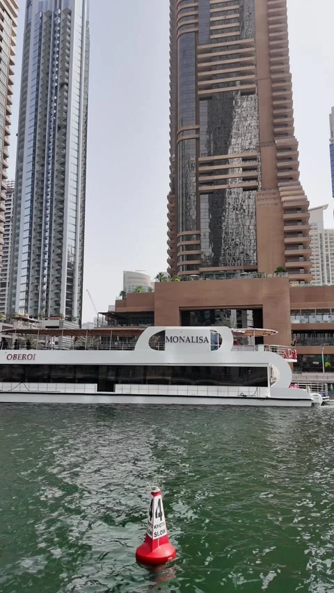 Dubai, UAE - May 26, 2026: Yachts docked in Dubai Marina. Stock Footage 335634130