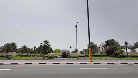 Dubai, UAE - May 26, 2026: Traffic on a road in Palm Jumeirah with modern s.. Stock Footage 335699228