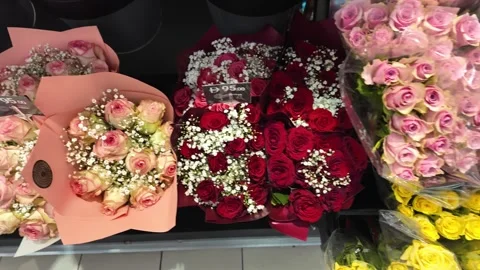Dubai, UAE - October 1, 2026 - Interior view of colorful flower bouquets an.. Stock Footage 346788191