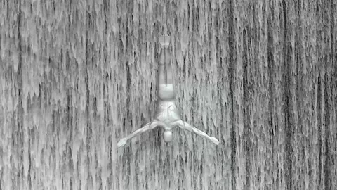 Dubai, UAE, October 5, 2019 - Flying man at the waterfall Stock Footage 149519645