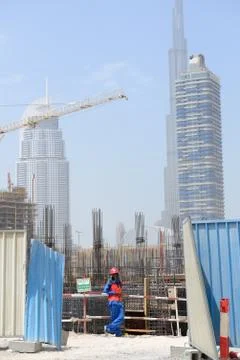 Dubai, uae - september 10: a worker on construction site in dubai down town. Stock Photos