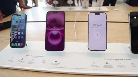Dubai, UAE - September 25, 2024 A branded Apple Store, customers look at the 動画素材 290179288