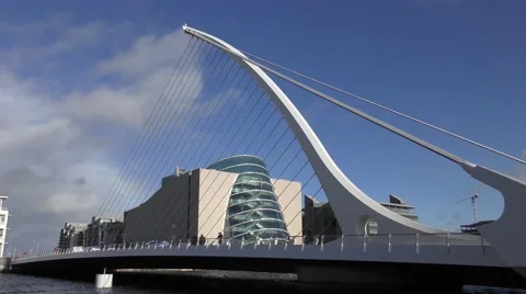 Dublin Samuel Beckett Bridge and Convention Centre blue sky Stock Footage