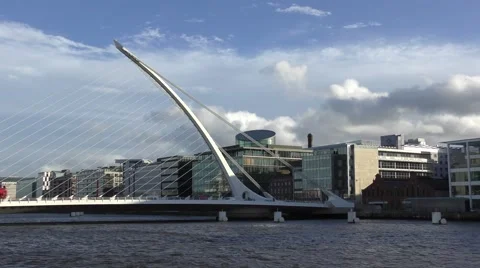 Dublin Samuel Beckett Bridge dramatic sky moving clouds Stock Footage 60003845