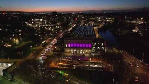 Dublin Train Station with Vibrant Purple Lights at Dusk Stock Footage 332444661
