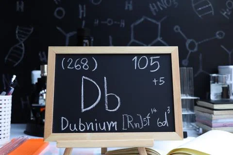 Dubnium and symbol structural formula chemical on the blackboard Stock Photos