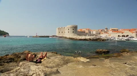 DUBROVNIK Beach People Tanning Stock Footage