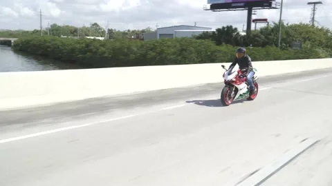 Ducati Motorcycle Over Bridge Video stock 168632799
