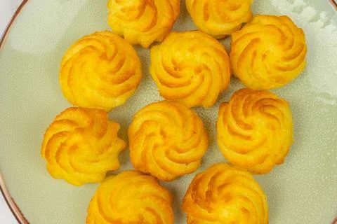 Duchess potatoes, close-up, on a plate Stock Photos