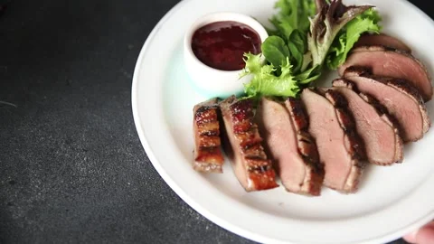 Duck breast dish slices poultry meat main course tasty snack fresh Stock Footage 329861990