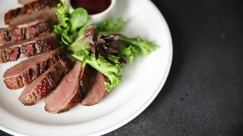 Duck breast dish slices poultry meat main course tasty snack fresh Stock Footage 329861994