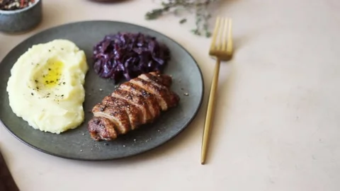 Duck breast with mashed potatoes and red cabbage. Stock Footage 196283782