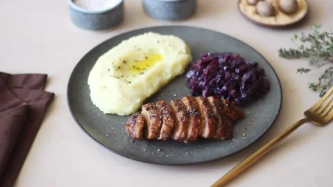 Duck breast with mashed potatoes and red cabbage. Stock Footage 196283789