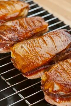 Duck breast on a wire rack Foto stock