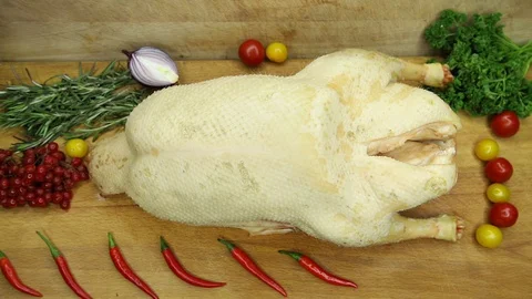 Duck decorated with vegetables from the chef in its raw form. Stock Footage 130003003