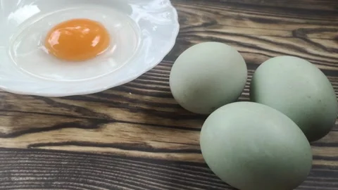 Duck Eggs on A Wooden Table Stock Footage 297281532