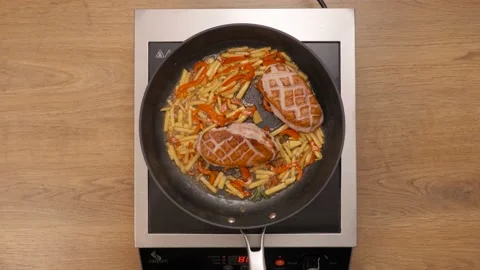 Duck fillet with pineapple fried in a pan. Cooking process. top plan. Part 2 Video stock 164046652