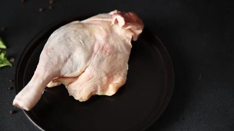 Duck leg raw meat poultry tasty snack fresh gourmet food background Stock Footage 329849029