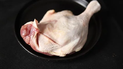 Duck leg raw meat poultry tasty snack fresh gourmet food background Stock Footage 329849031