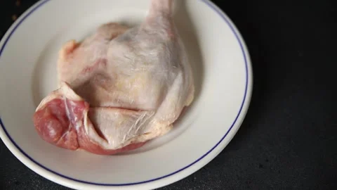 Duck leg raw meat poultry tasty snack fresh gourmet food background Stock Footage 329849032