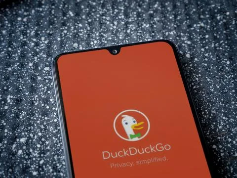 DuckDuckGo Private Browser app launch screen on smartphone on metallic back.. Stock Photos