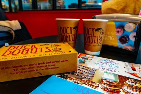 Ducks Donuts on Table Top Stock Photos