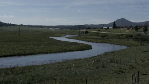 Ducks fly in and land on a Stream in Lake George Colorado Stock Footage 85225107