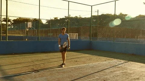 Dude playing tennis Stock Footage 92934021