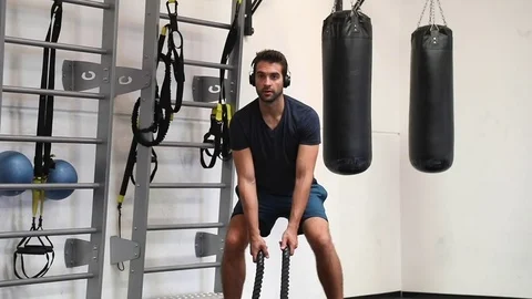 Dude in rope workout Stock Footage 80497743