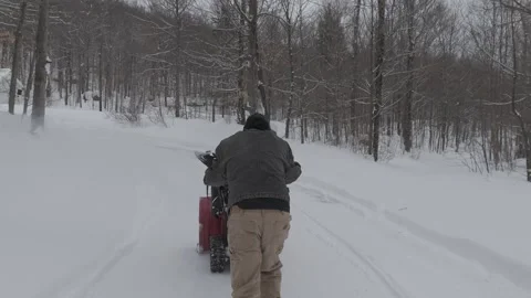 Dude snowblowing Stock Footage 301876837
