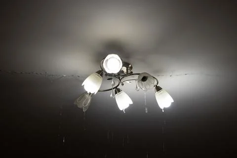 Due to a pipe break, there was a flood in the apartment upstairs and water .. Stock Photos