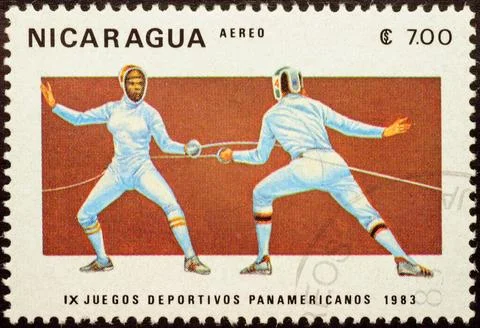 Duel of two fencers on post stamp Stock Photos