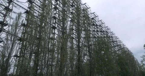 Duga radar Chernobyl Zone behind trees Stock Footage 200838142