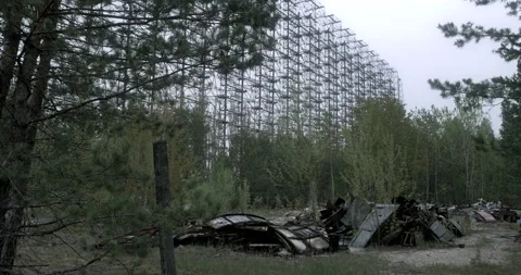 Duga radar Chernobyl Zone behind trees Stock Footage 200838391